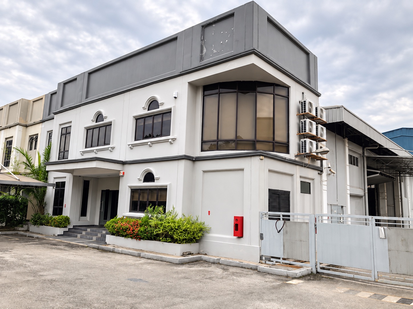 Front exterior of a semi-detached factory in Taman Sains Selangor, Kota Damansara